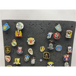 Large collection of approximately one hundred enamel badges and key rings, relating to British and World football clubs, vesper etc