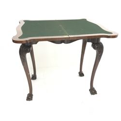 Early 20th century Georgian style figured walnut card table, shaped banded fold over top with baize lined interior, on four acanthus and scroll carved cabriole supports with ball and claw feet, W77cm, H76cm, D43cm
