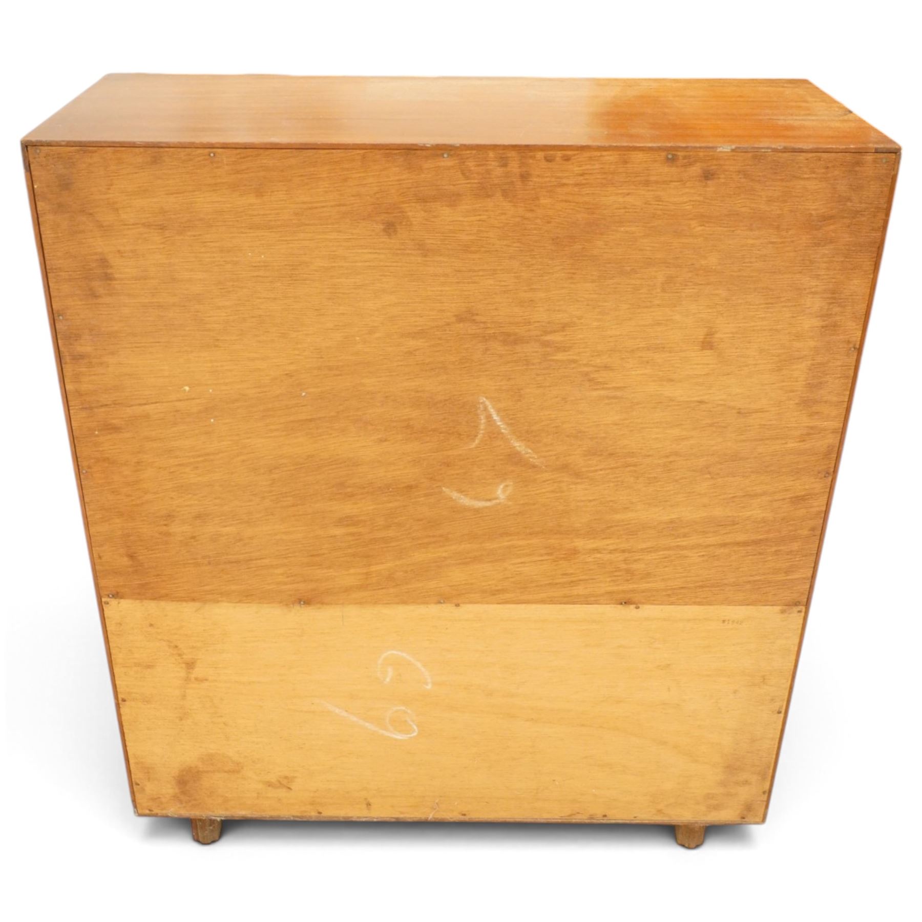 Robert Heritage (1927-2008) for Beaver & Tapley - Mid 20th century teak bureau, fall front with fitted interior, above a sliding door cabinet, raised on short supports