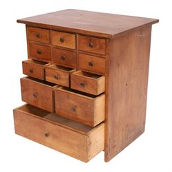 Miniature pine table top chest of twelve drawers, H35cm