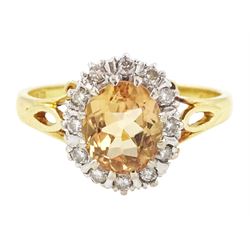 18ct gold imperial topaz and diamond cluster ring, oval cut topaz of approx 1.50 carat, su...