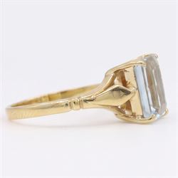 Early - mid 20th century gold aquamarine ring, four claw set with a single emerald cut aquamarine of approx 1.40 carat, stamped 18ct