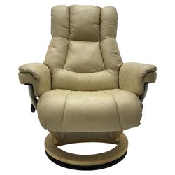 Reclining armchair upholstered in cream leather