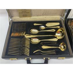 Bestecke Solingen canteen of gold plated cutlery for twelve place settings, including ladle, cake slice and serving spoons, contained within a briefcase, together with a matching set twelve of Bestecke Solingen gold plated fish knives and forks, in fitted case 