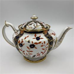 Early 20th century Royal Crown Derby teapot, decorated in a variant of the Imari pattern with blue and red prunus blossoms, with printed mark beneath including illustration date code for 1927, H14cm
