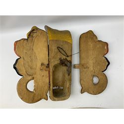 Sri Lankan Cobra mask depicting the demon Naga Raksha, together with a smaller example, largest H46cm