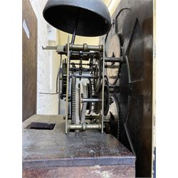 18th century c1760 oak cased George III longcase clock by William Eastwood of Burnley, with a stepped caddy top on a projecting cornice and blind frieze, square glazed door flanked by two turned pillars with gesso capitals, trunk with conforming recessed pillars and a full length wavy topped door, on a square plinth with a raised panel and shaped skirting, 12” square brass dial, 11” chapter ring with Roman numerals and five-minute Arabic's,  
