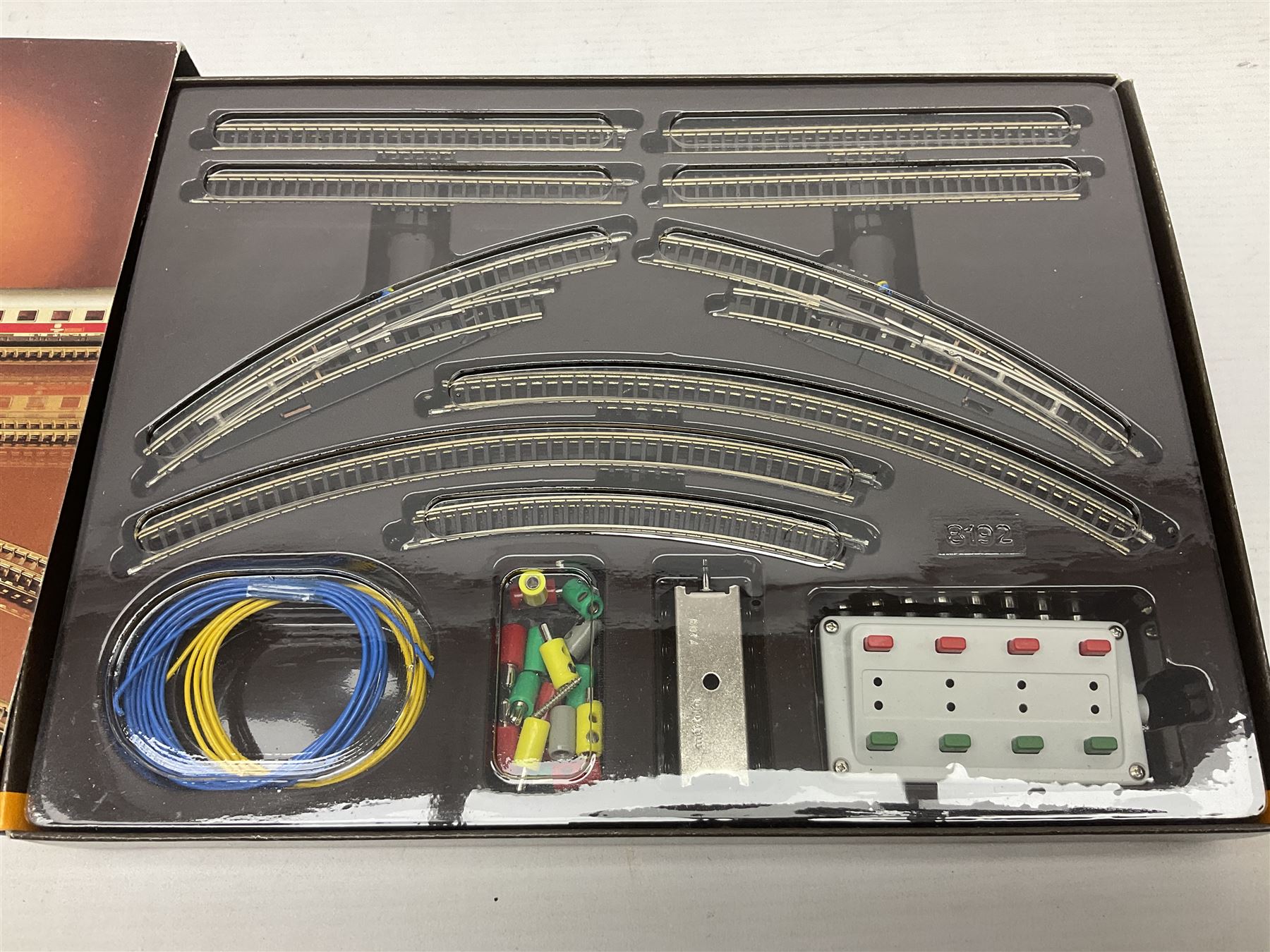 Marklin 'Z' gauge Mini-Club - Track Set-T1; part box No.8500 track; six goods wagons Nos.8610, 8611, 8622, 82271, 82351 & 82373; and a passenger coaches No.87335; all boxed (9)
