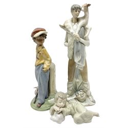 Three Lladro figures, comprising The Wanderer, gres finish, no 2271, Shepherd Boy with Goat, no 4506, and Heavenly Dreamer, no 5728, two with original boxes, largest example H28cm
