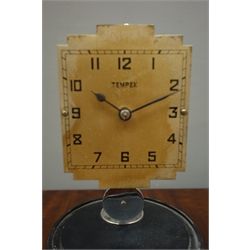  'Tempex' Art Deco period electric magnetic clock, stepped rectangular silvered dial, on circular black bakelite plinth, H30cm  