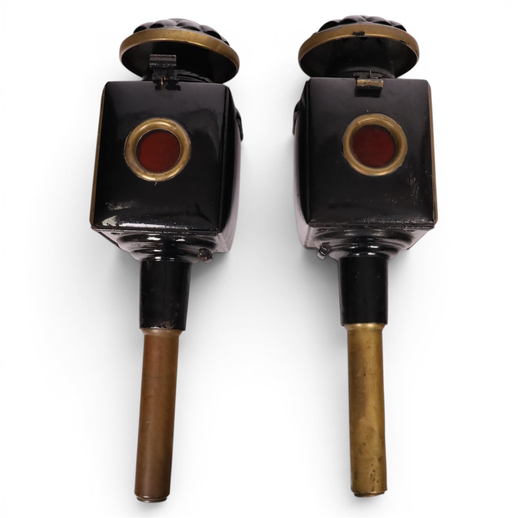 Pair of brass and toleware carriage lamps, the traditional chimney over a rectangular form body with bevelled glass, reflective panels, and rear circular red reverse light, H43cm
