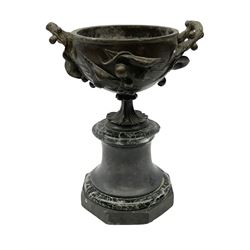 19th century bronze twin handled urn, decorated in high relief with stylized leaves and berries, raised upon marble pedestal base, H22cm