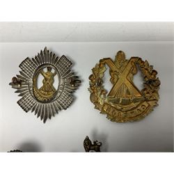 Fifteen Scottish Glengarry and other metal military badges including Argyll & Sutherland, Royal Glasgow Yeomanry, Cameronians, Lanarkshire Yeomanry, Kings Scottish Own Borderers, Highland Light Infantry, Border Regiment, Lowland Regiment, Lothians & Border Horse Yeomanry, Ayrshire Earl of Carricks Own Yeomanry etc