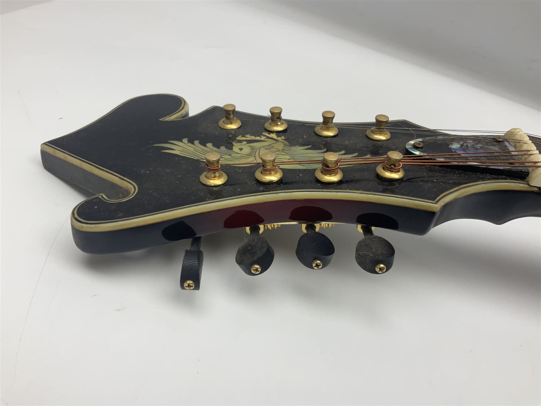 Eastern eight-string mandolin with red sunburst finish and mother-of-pearl inlay of eagles, clouds, trees etc L86cm; in fitted hard carrying case