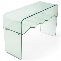 Contemporary glass two-tier console table of minimalist design, rectangular top with a single sheet of curved glass with a waved under tier supported with metal fittings 