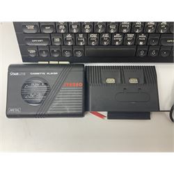 Sinclair ZX Spectrum (1984) with accessories and games; ten games for Sinclair Spectrum and 48K Spectrum to include ‘Knight Lore’, ‘The Way of the Exploding Fist’, and ‘Green Beret’ all in original boxes, ‘Rambo First Blood Part II’ without original box; Sinclair UK1400 Power Supply Unit, Hales Universal Mains Adapter, RAM Turbo Spectrum Joystick Interface, Starlite Cassette Player, all without boxes