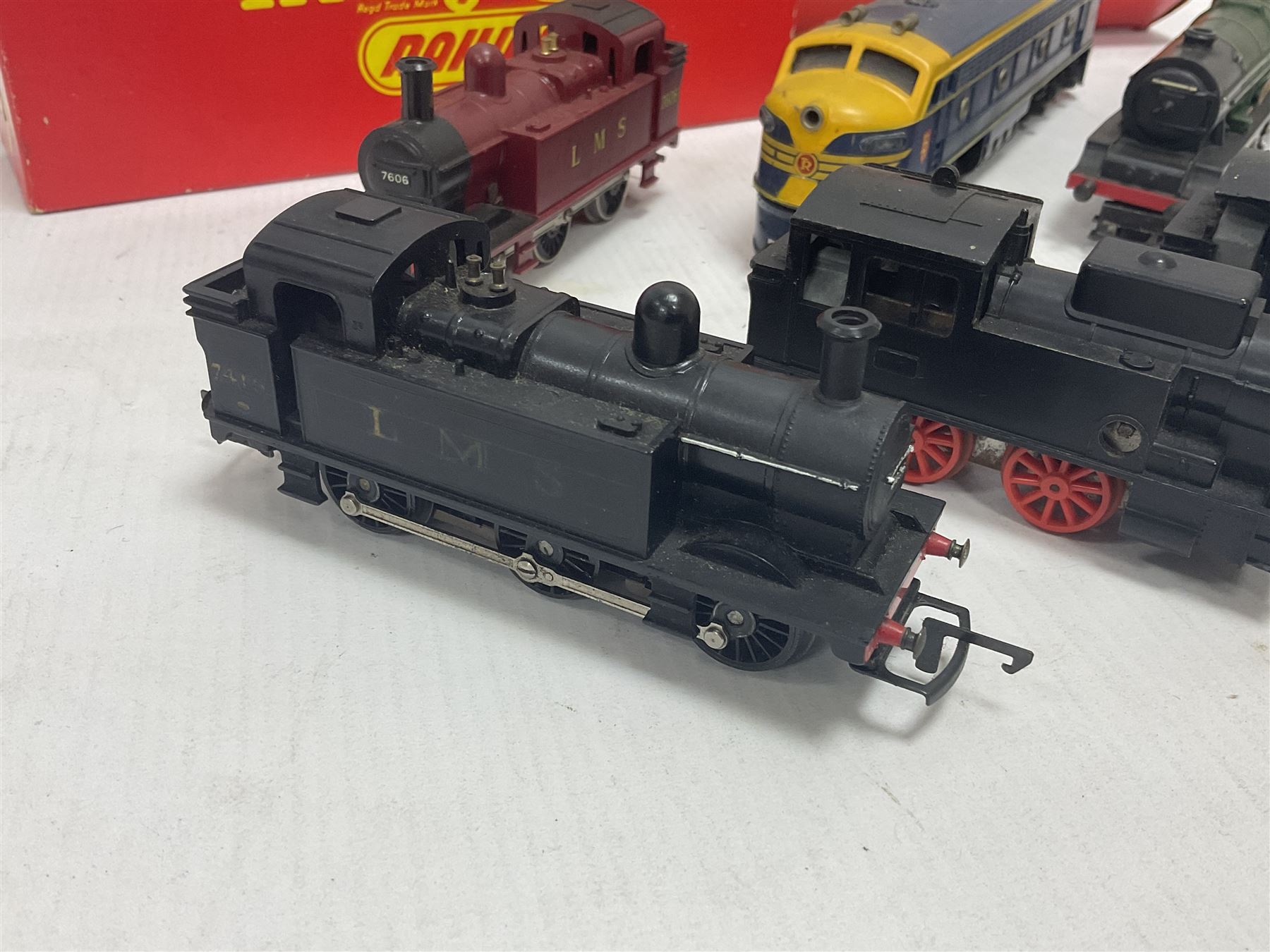 Hornby/Tri-Ang ‘00’ gauge - nine locomotives to include Britannia Class ‘Britannia’ 4-6-2 no.70000 in BR green; Class M7 4-4-0 Tank no.30027 in BR black; Princess Class ‘Princess Victoria’ 4-6-2 no.46205 in BR black; in original boxes; further loose models Princess Class ‘Princess Elizabeth’ 4-6-2 no.46201 in BR green; Class 3F 0-6-0 tank no.7606 in LMS crimson; TR double ended diesel locomotive; three further tank locomotives and one loose tender (10) 