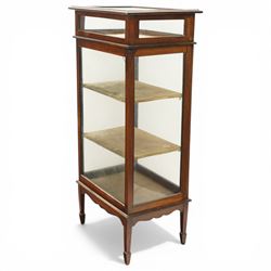 Edwardian inlaid mahogany glass cabinet with bijouterie upper section, four tier design with velvet lined interior shaped apron raised on spade feet