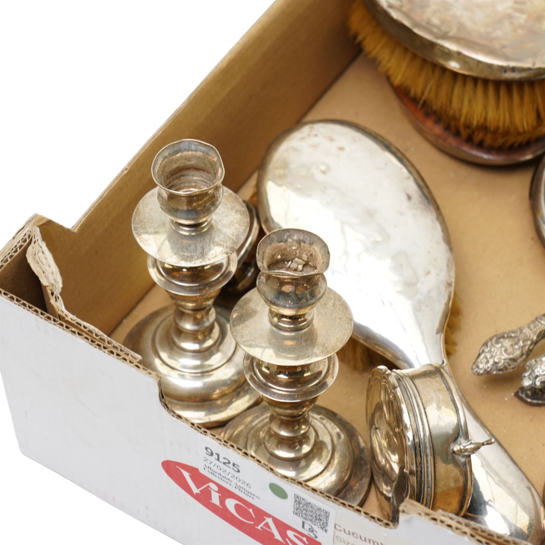 Quantity of silver items including brushes, mirror, pair of candlesticks, ring box etc
