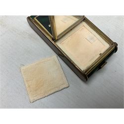 Art Deco camera shaped lady's musical compact and cigarette case, probably German, with green marble effect panels and gilt highlights, with large hinged opening to reveal engine turned brass interior with cigarette or lipstick holders, and the other side with musical mechanism and flip action powder compartment with mirror, L10cm