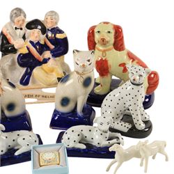 Collection of Staffordshire style figures, including dogs, cats, Death of Nelson etc 