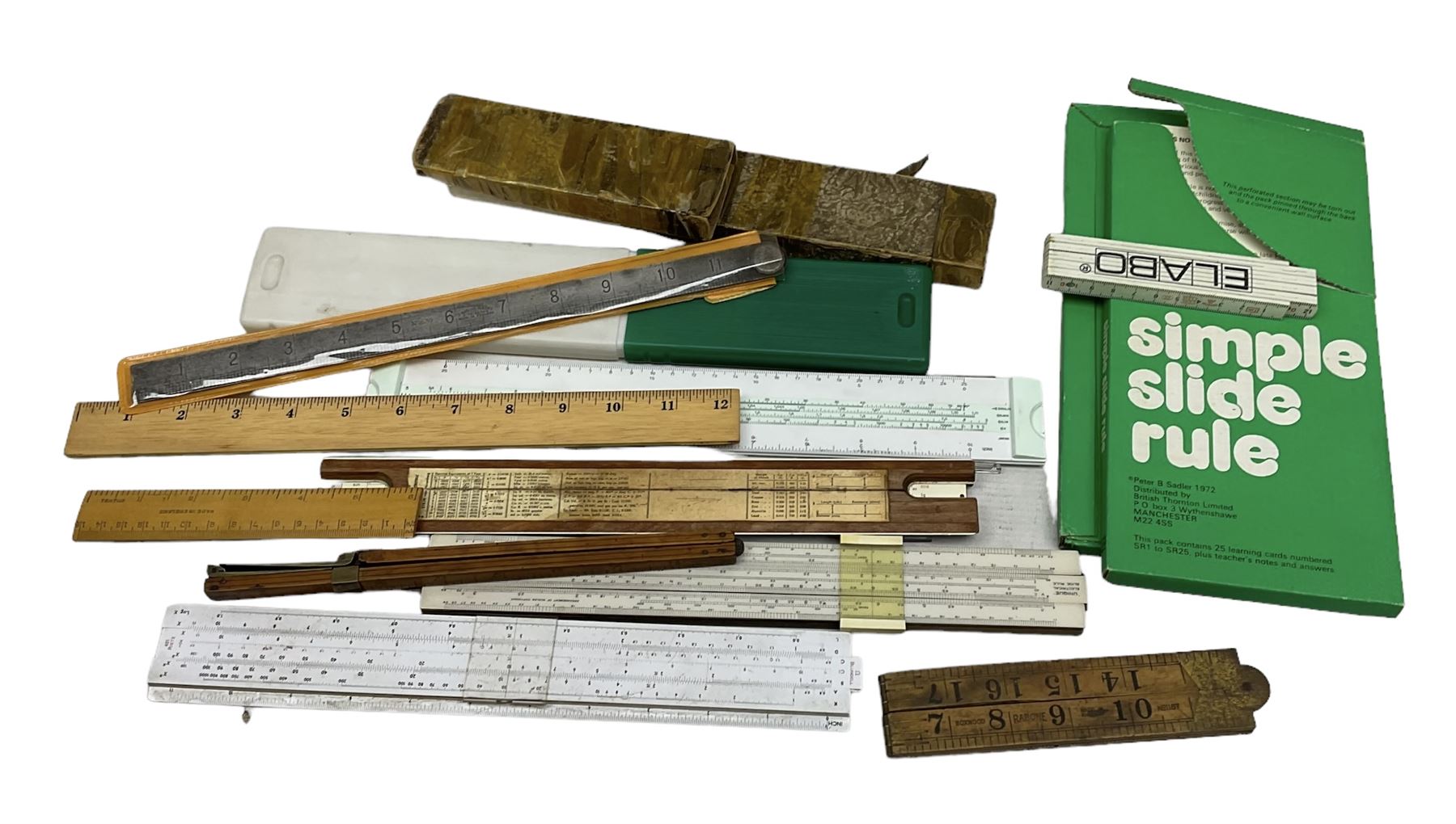 Quantity of slide and folding rules etc to include Jakar No 29, Blundell, Unique Electrical, Castell, Thomas Bradburn & Sons folding rule, Rabone folding rule etc