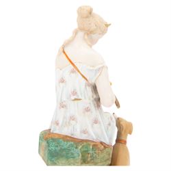  20th century bisque figurine, modelled as Artemis seated upon a rock, with impressed L&M mark beneath, H36cm
