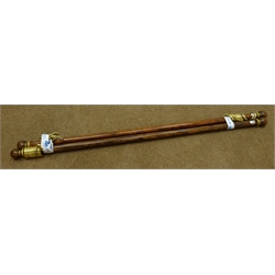  Two medium wood and gilt circular curtain poles with round finials,each with brass fittings and fourteen rings, L180cm  