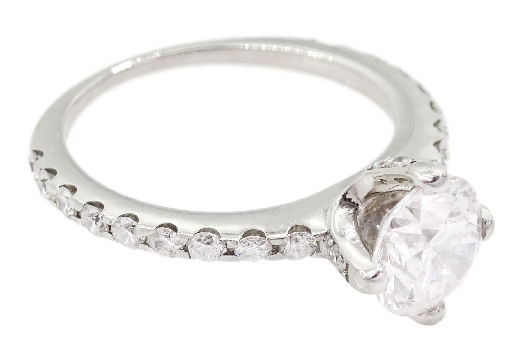 Platinum single stone round brilliant cut diamond ring, with diamond set shoulders and diamond set gallery, principal diamond approx 1.00 carat