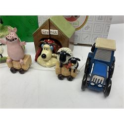 Border Fine Arts Shaun The Sheep Tractor Train and musical figure, together with a Wallace and Gromit photograph frame and a Gromit cruet sett, three in original boxes  