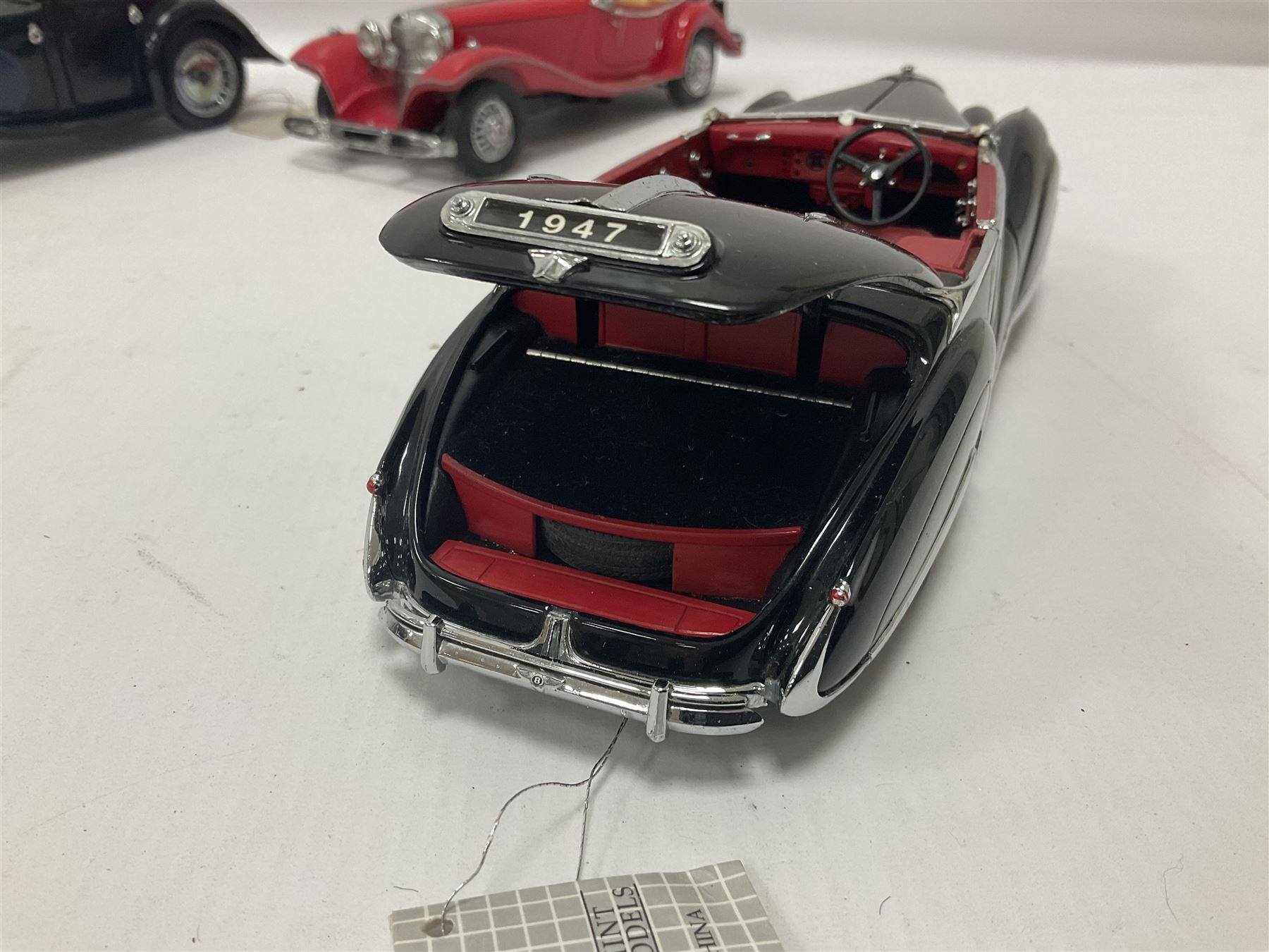 Franklin Mint - five 1:24 scale die-cast precision models comprising 1930 Bugatti Royale Coupe Napoleon, 1933 Duesenberg SJ Twenty Grand, 1935 Mercedes Benz 500K Special Roadster, 1938 Jaguar SS-100, and 1947 Bentley 