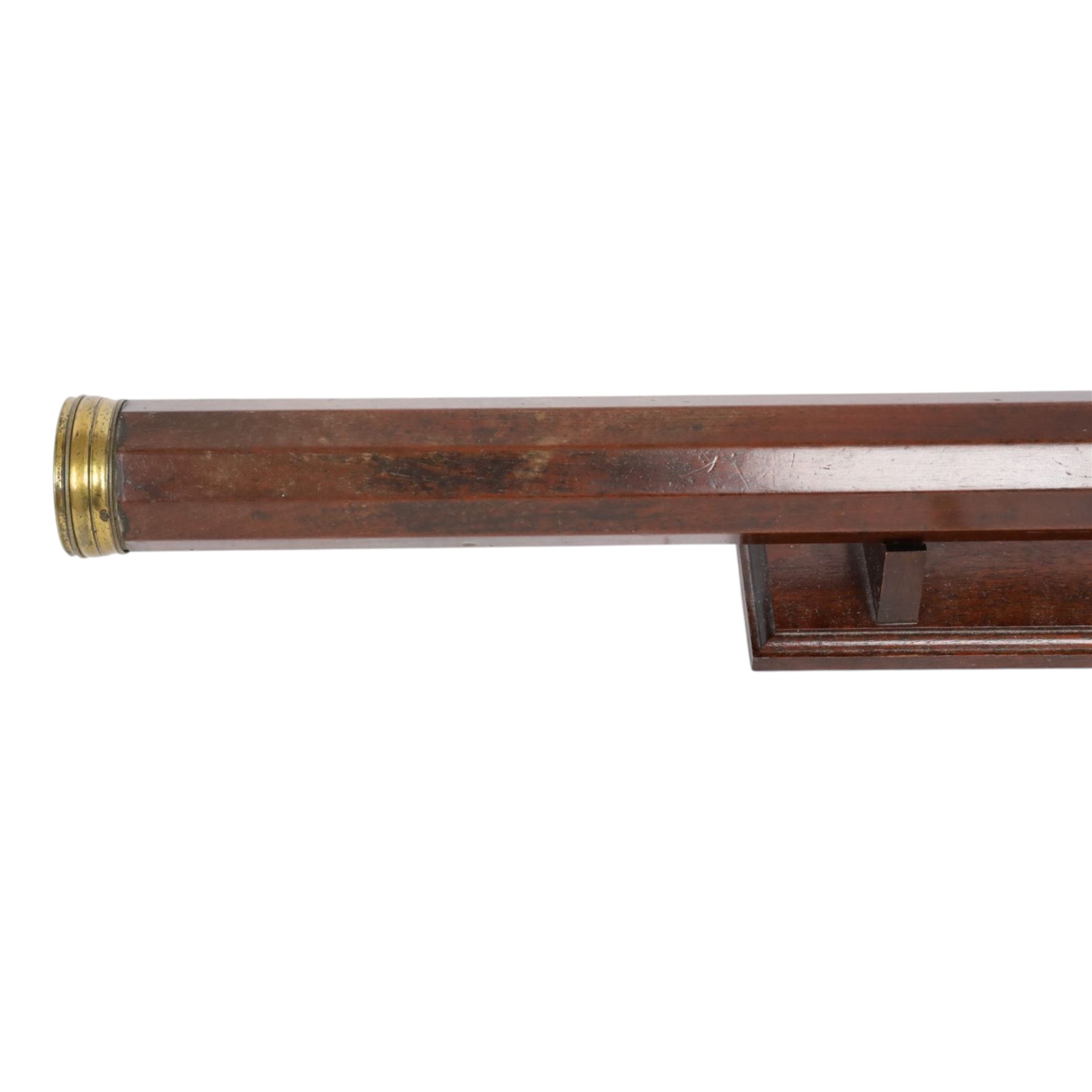 Late 18th century decagonal mahogany telescope, with brass eyepiece and cap, both with brass shutters, unmarked, upon wooden stand