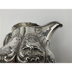 Victorian silver three piece tea service, comprising teapot, twin handled open sucrier, and milk jug, each of bellied form with acanthus capped scroll handles, the sides embossed with alternating scroll edged vacant panels and panels containing a pair of birds, upon four palmette feet, the teapot with ivory insulators to handle, and bird finial to the hinged domed cover, hallmarked William Hunter & Son, London 1861, teapot H19cm, including handles sucrier H13.5cm, including handle milk jug H12cm

This item has been registered for sale under Section 10 of the APHA Ivory Act