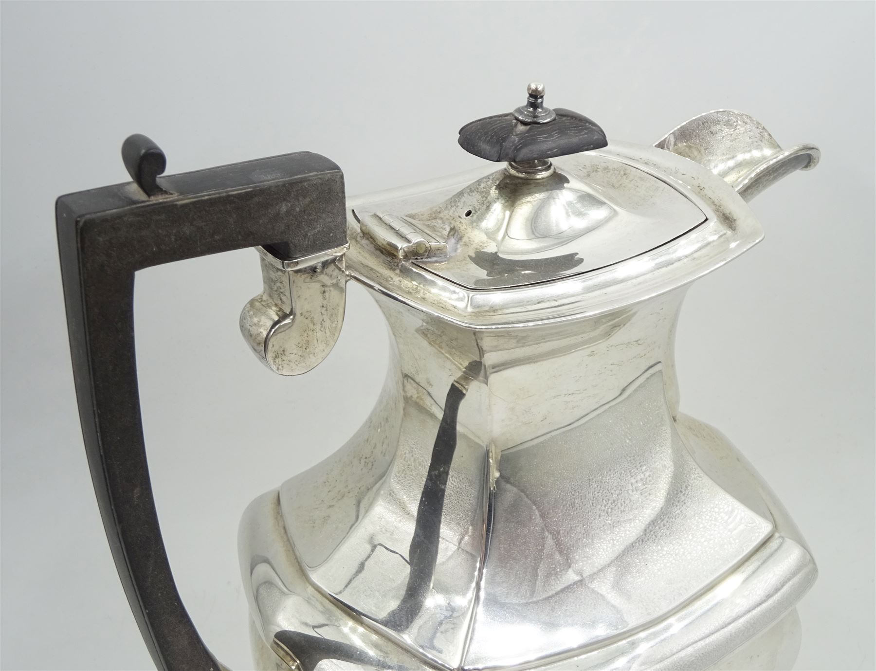 Raich Carter - presentation hallmarked silver two-handled tray of rounded oblong form with gadrooned rim by Wilson & Gill, 139 Regent Street, London, inscribed to the centre 'Presented to Mr. & Mrs. Raich Carter by the Lord Mayor of the City and County of Kingston-upon-Hull Alderman R.E. Smith J.P. on May 30th 1952on behalf of the many Admirers who subscribed to The Lord Mayor's Testimonial Fund in recognition of Raich Carter's genius as a footballer and his services to the City', London 1937 82oz L61cm; together with a hallmarked silver four-piece tea and coffee set by Cooper Bros. & Sons Ltd, the teapot of London shape with ebonised handle and knop, each piece engraved with an initial 'C', Sheffield 1920  60.5oz, teapot L29.5cm