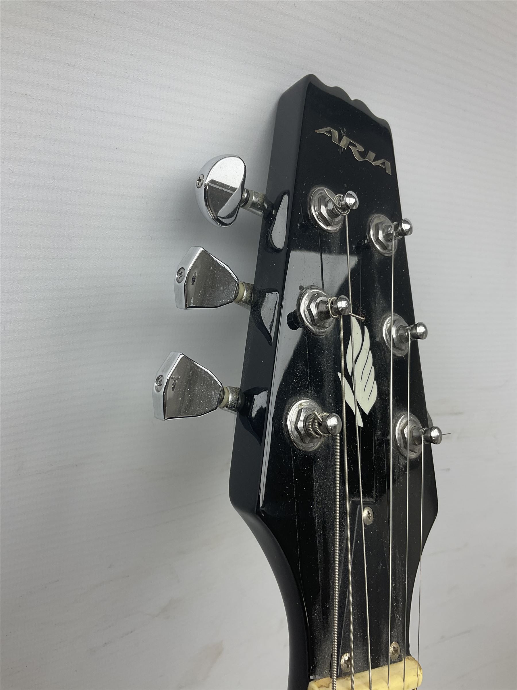 Aria Les Paul style electric guitar, no.037704CH L102cm; with amplifier, soft carrying case and stand; together with various guitar songbooks etc