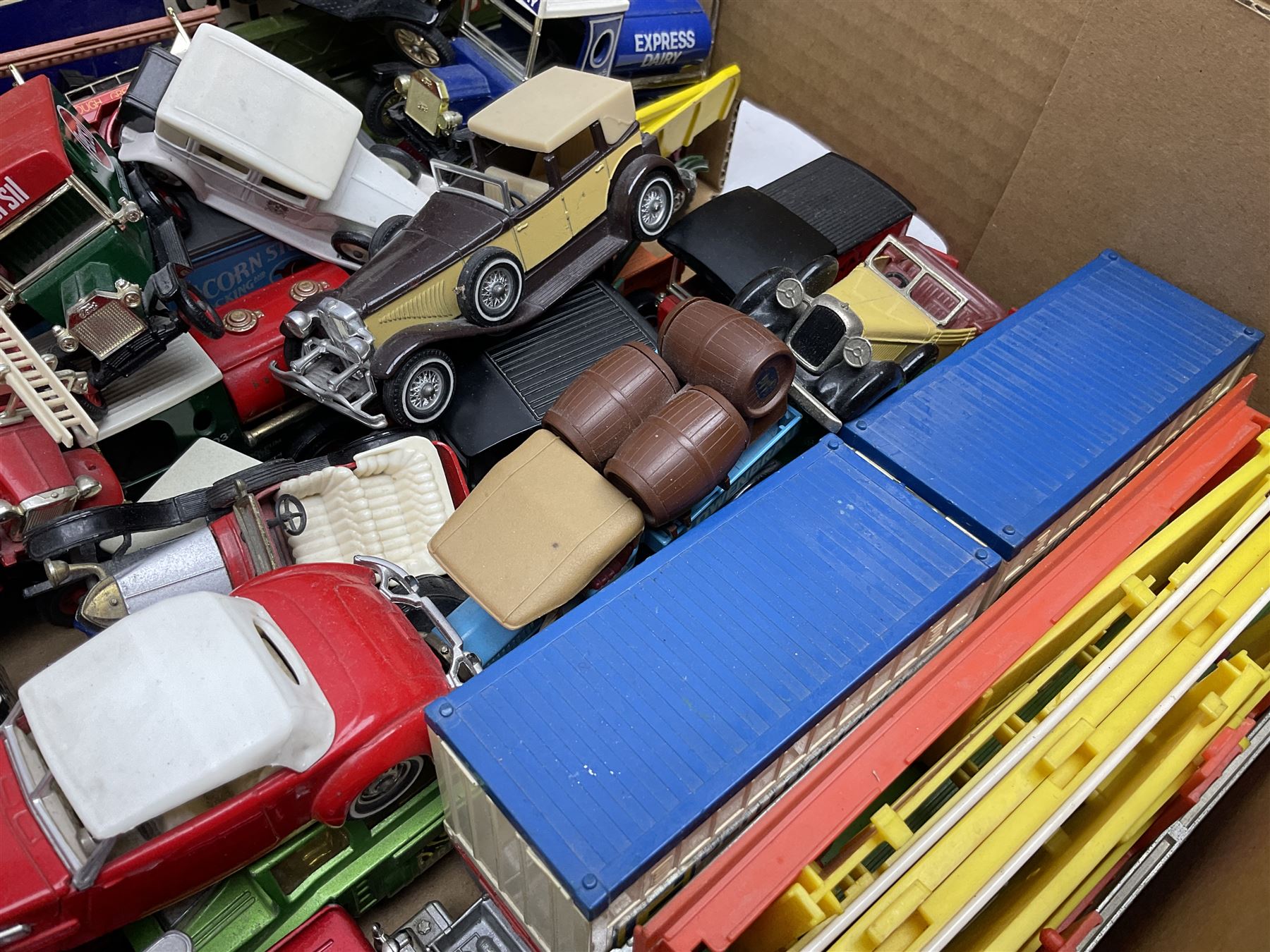 Over fifty modern die-cast models, predominantly Matchbox, including cars, promotional  and commercial vehicles; and a quantity of flat-packed model boxes