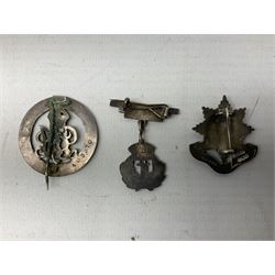 Military metal lapel and pin back badges to include stamped silver Old Coldstreamers Association example and another stamped silver badge, Royal Warwickshire examples, Glamorgan Yeomanry etc