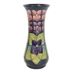 Moorcroft vase Violets pattern, of slender fluted form, with original box H21cm