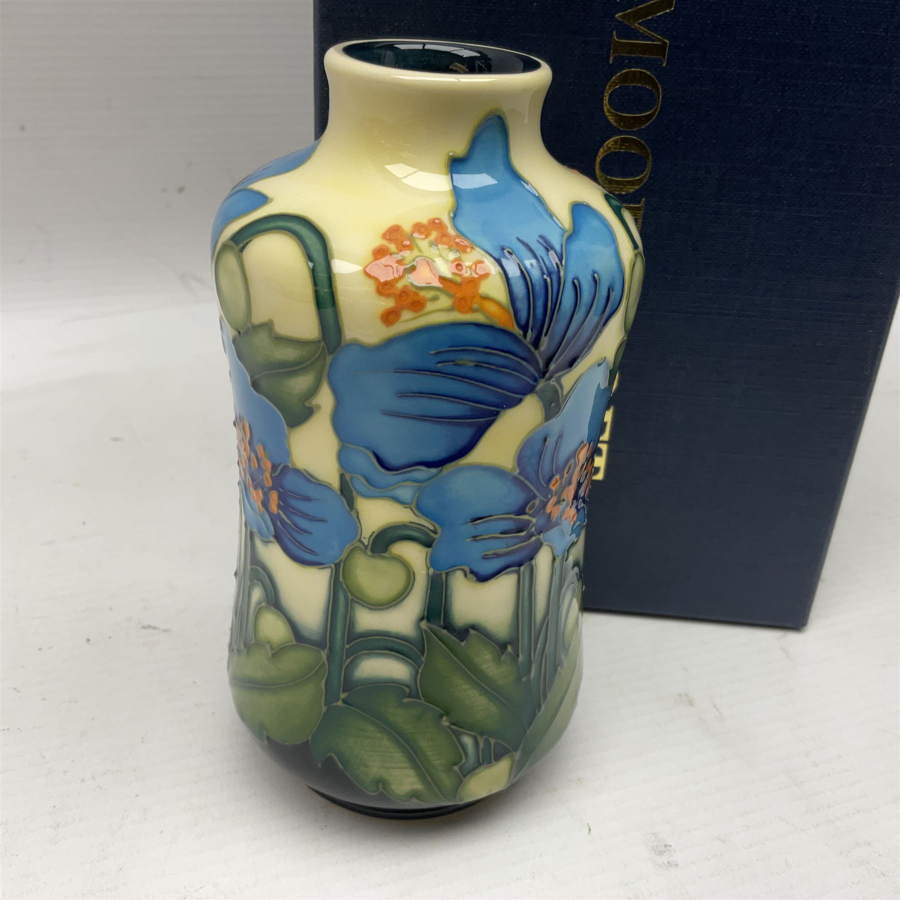 Moorcroft vase, of waisted form, decorated in the Cambrian Blue pattern by Kerry Goodwin, circa 2011, H14cm, with original box 