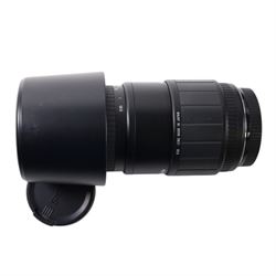 Eight camera lenses, comprising Canon Ultrasonic Zoom EF 75-300mm 1:4-5.6 lens, AF Nikkor 35-70mm 1:3.3-4.5 lens, Nikkor 60-180mm 1:4.5-5.6 lens, Canon Zoom EF 28-80mm 1:3.5-5.6 lens, Canon Zoom EF 80-200mm 1:4.5-5.6 lens, Sigma 70-300mm 1:4.6-5.6 DL Macro, Sigma Zoom 70-210mm 1:4-5.6 UCII lens and a Sigma AF 70-300mm 1:4-5.6 APO Macro lens, all with lens caps