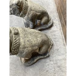 Pair of cast stone garden British bulldogs, on shaped plinths