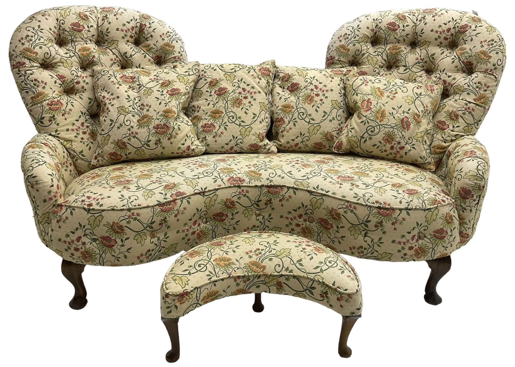 Victorian design hardwood-framed double back settee, upholstered in buttoned floral pattern fabric, curved back over serpentine seat, on cabriole feet, with matching scatter cushions (W182cm, H94cm, D86cm); together with crescent-shaped footstool with cabriole feet (W55cm)