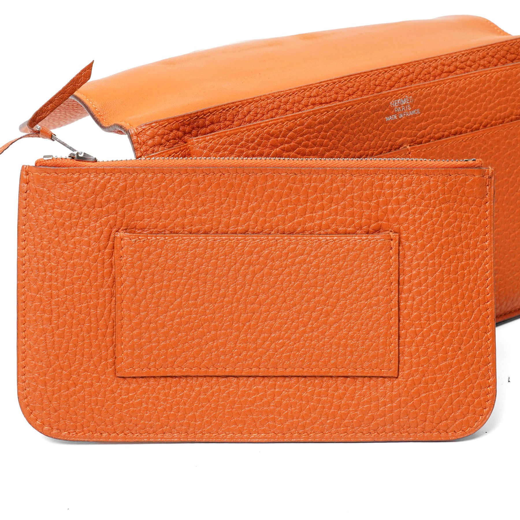 Hermès - Dogon Duo wallet, orange Togo leather, with palladium-plated Clou de Selle fastening, detachable zipped coin purse and fitted interior, stamped 10N H, with original box