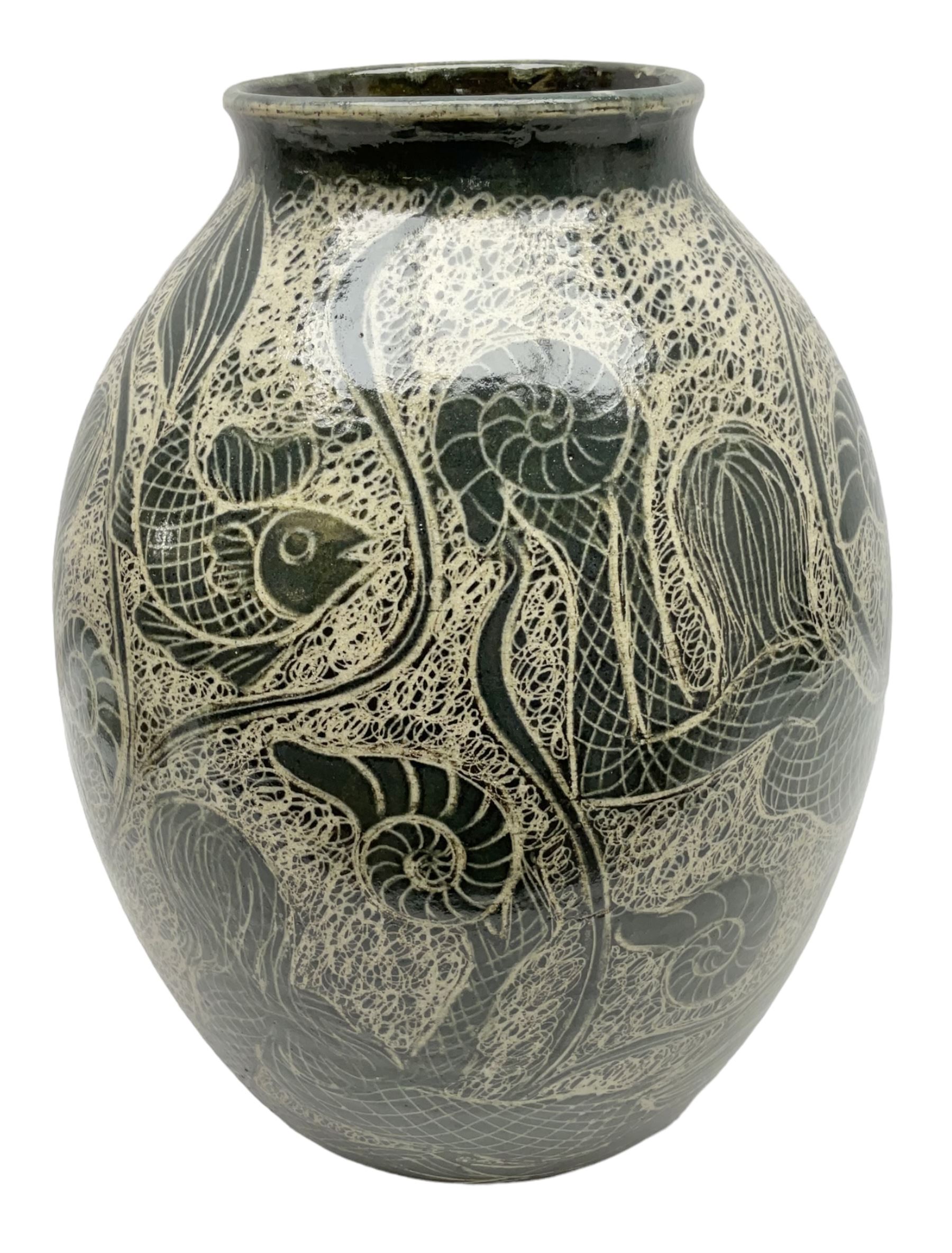 John Egerton (c1945-): studio pottery stoneware vase decorated with fish, mermaids and ammonites, H38cm
