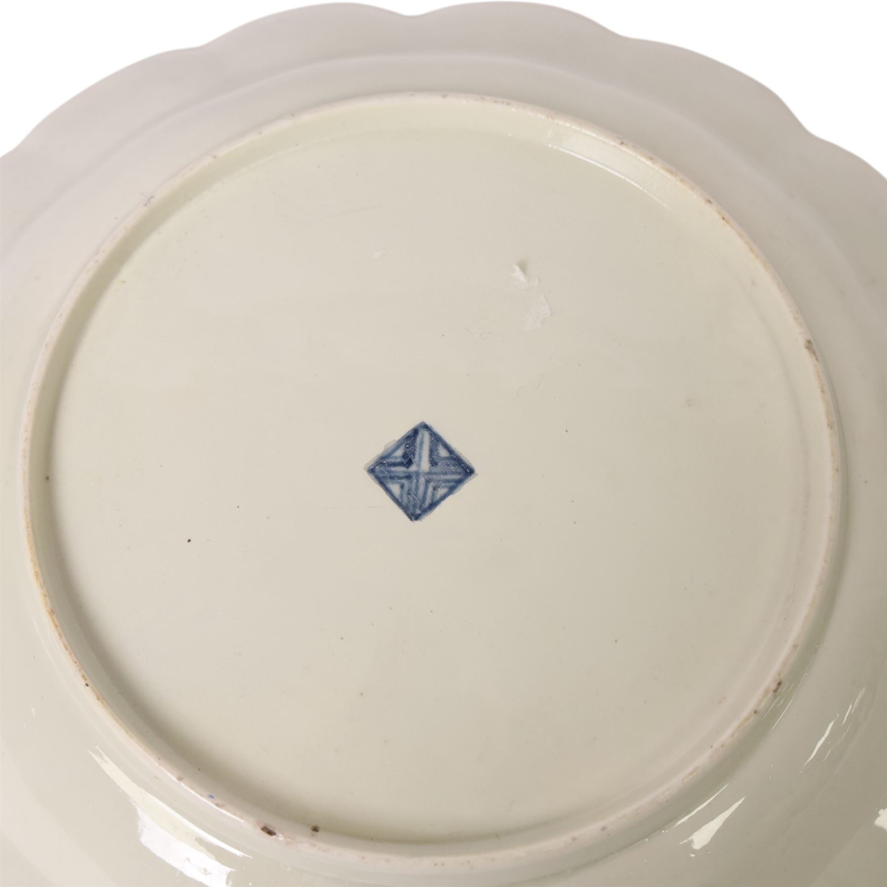 Pair of Worcester junket dishes, c1770, painted with panels of flowers on a blue scale ground within richly gilt rococo style borders and scalloped rim, hatched square mark to base, D24.5cm (2)
Notes: label suggests provenance relating to the Brownlow family of Belton House.