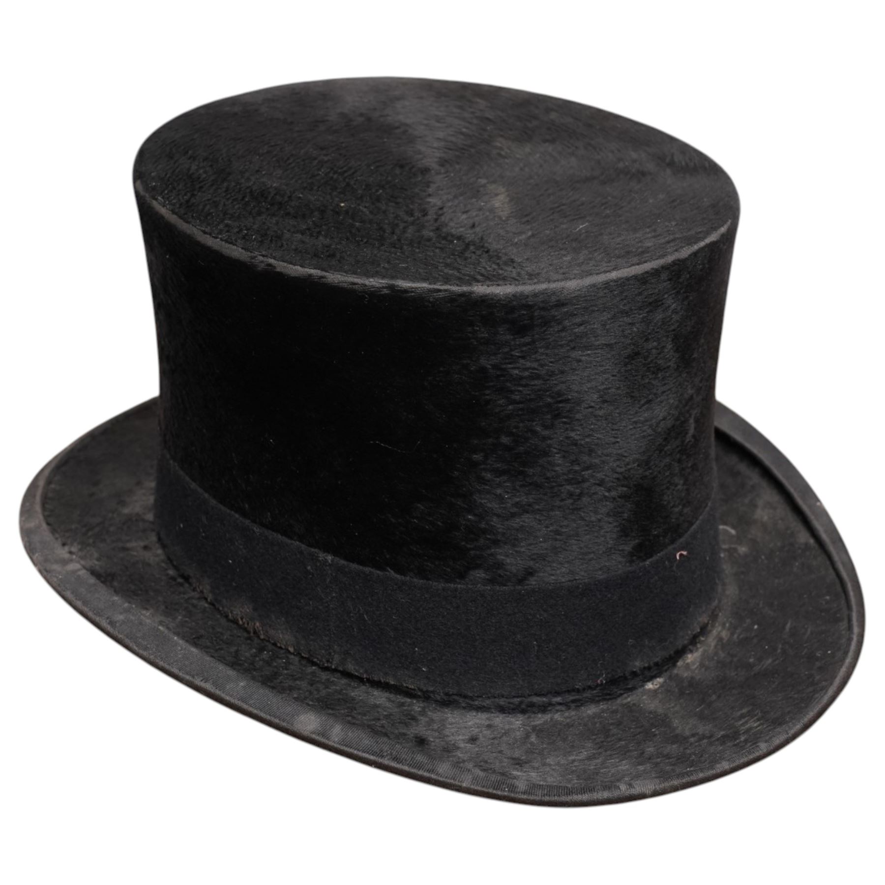 Victorian leather travelling case for hats, with C.A. Dunn top hat, the case with impressed Army & Navy Makers mark, the lid with the initals W.S.H.S, with key, H31cm, W45cm, D50cm
