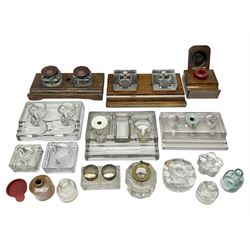 Collection of inkwells and inkstands, to include glass, wooden and ceramic examples 