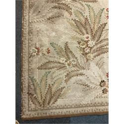 Early 20th century beige ground carpet decorated with flowers and foliage, repeating boarder, field of flowers and foliage 