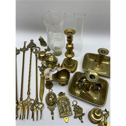 Brasswares, including oil lamp, decorative hooks, toasting forks, candle sticks, letter openers etc. 