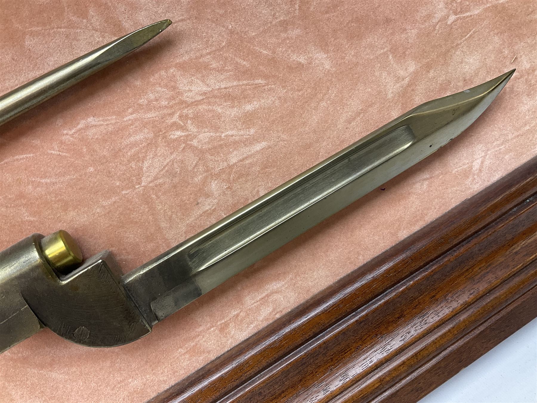 WW2 Lee Enfield No.4 Mk.1 .303 bolt-action rifle with hinged butt compartment, made by SA Ltd., Long Branch, Canada 1942, serial no.5L0646 L113cm; mounted on a framed display board with No.4 Mk.II spike bayonet, No.9 Mk.1 blade bayonet, two inert 5-round clips and brass biographical plaque by Antler Military Originals detailing DA Cert No.C3444 OLD STYLE DEACTIVATION SO FIREARMS CERTIFICATE REQUIRED OR RFD